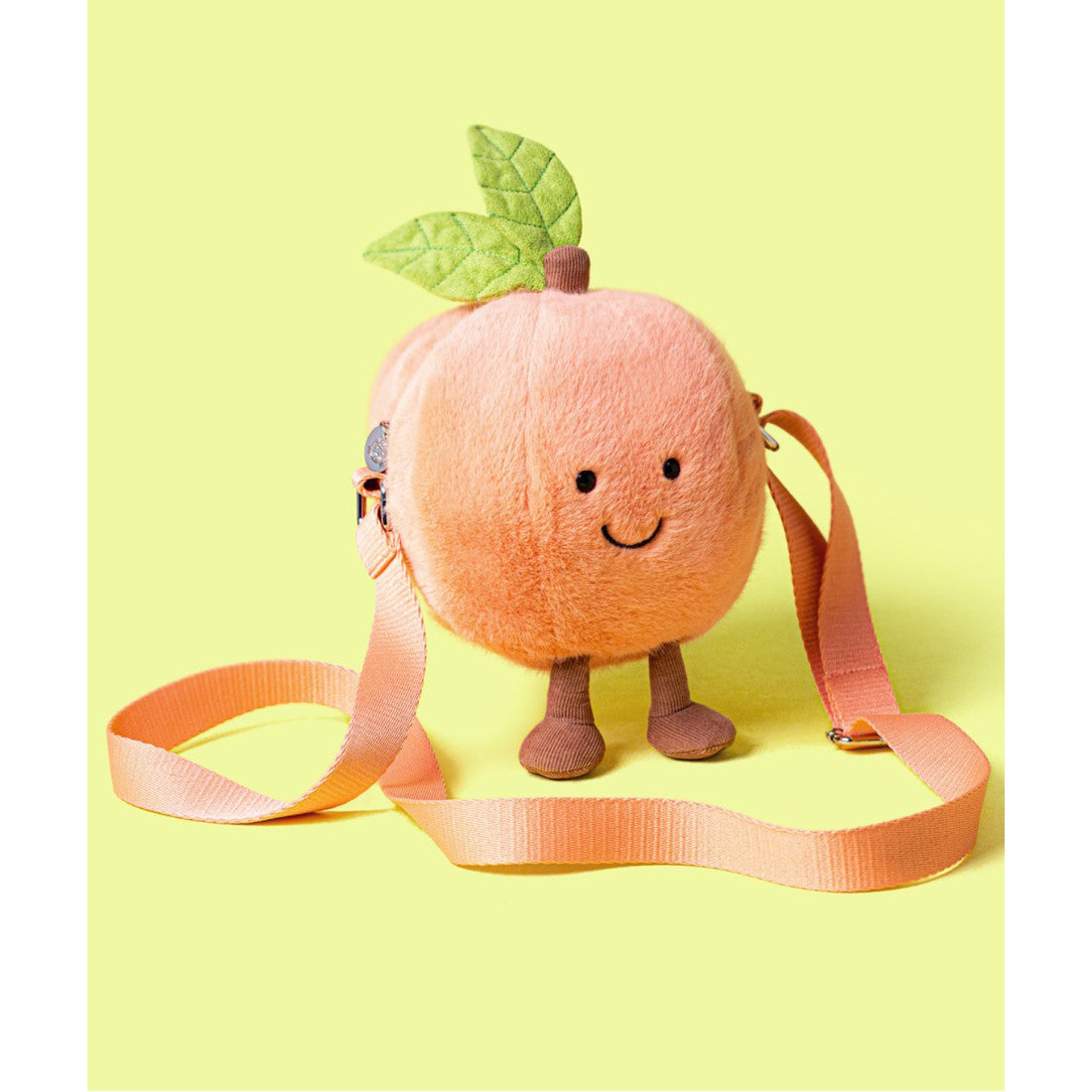Torebka na ramię Jellycat Amuseables – Brzoskwinia 18 cm, torebka na żółtym tle